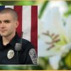 A police officer was fatally shot during a struggle with an assault suspect in the woods in a Virginia mountain town, authorities said Saturday.