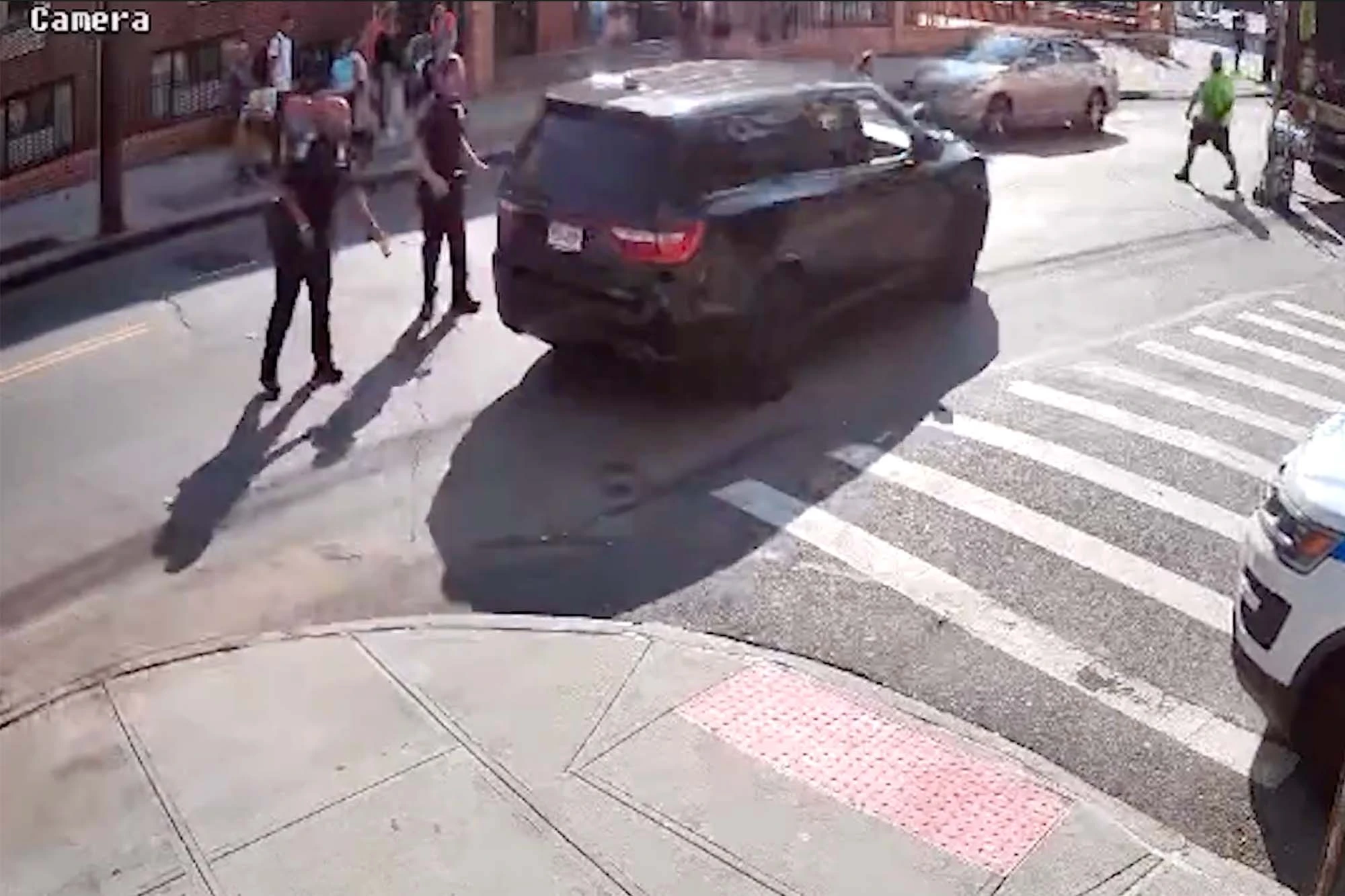 A GrubHub delivery driver on an electric bike slammed into a mom pushing her two-year-old in a stroller in a Manhattan intersection and then sped away.