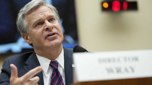 FBI Director Christopher Wray recently shared his concerns with China's use of AI and their hacking activities. (Photo: NPR)