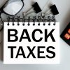 IRS announced recently that those with back taxes will be waived of penalty fees. (Photo: Detaxify)