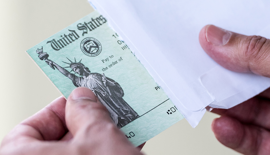 The next wave of stimulus checks is expected to be distributed this month. (Photo: AARP)